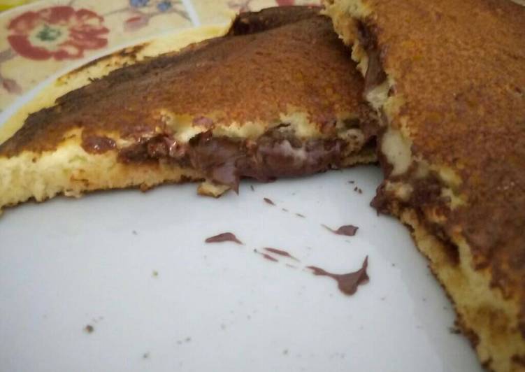 Step-by-Step Guide to Make Qualsiasi sera della settimana Pancake ripieni di nutella