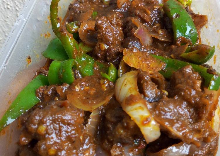 Asun (spicy peppered goat meat)