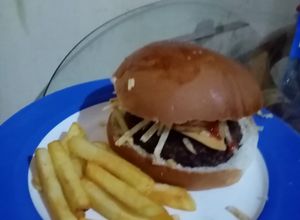 Una foto de Hamburguesa norteamericana angus beef a la parrilla