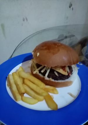 Una foto de Hamburguesa norteamericana angus beef a la parrilla