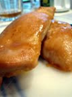 A picture of Honey and mustard chicken breasts.