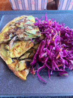 Una foto de Tortilla de zapallo italiano y champiñones
