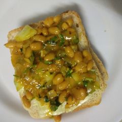 A picture of Sandwich with beans.