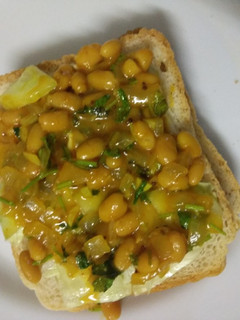 A picture of Sandwich with beans.