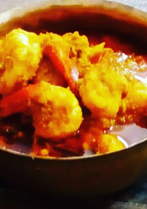 A picture of Chingri macher malai curry.