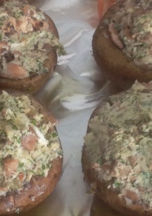 A picture of Goat cheese stuffed mushrooms.