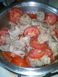 Una foto de Carne de res en cebollada