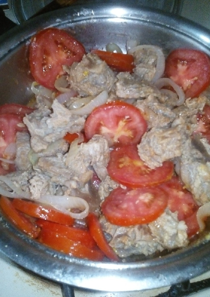 Una foto de Carne de res en cebollada