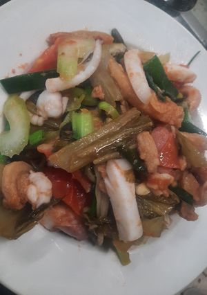 Hình của món Mực nang xào dưa cải.