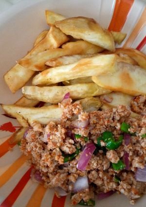 A picture of Sweet potatoes with egg sauce.