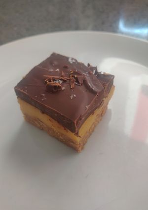 A picture of Dark Chocolate Millionaire Biscuit Squares.