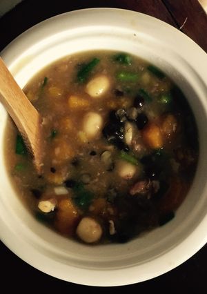 A picture of Brown Rice Porridge with Lotus Seeds, Black Beans, and Pumpkin.