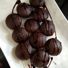 A picture of Appam cake pops.