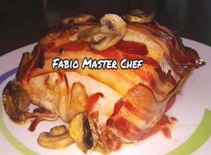 Foto di Arista di Maiale avvolta nella Pancetta Affumicata e Funghi Champignon al Forno