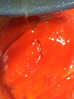 Una foto de Pimientos rojos asados en su jugo Olla Gm G