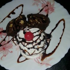 A picture of Brownie with ice cream.