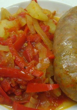 Una foto de Chorizos a la sidra entomatados