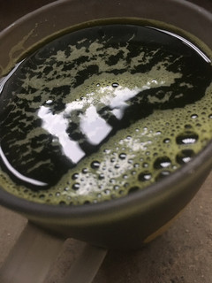 A picture of Bitter leaf and scent leaf juice.