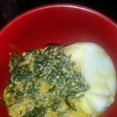 A picture of Egusi and bitter leaf soup.