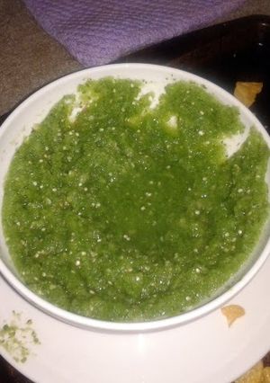 A picture of green salsa.