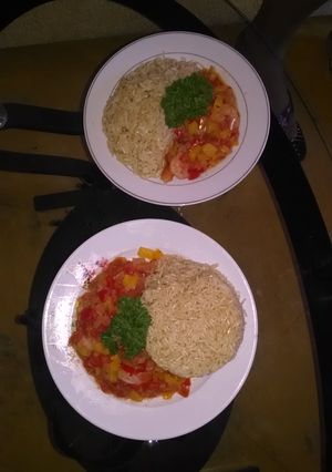 Una foto de Camarones salteados al vino con arroz integral