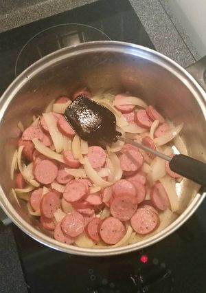 A picture of Sausage and Onions Over Rice.