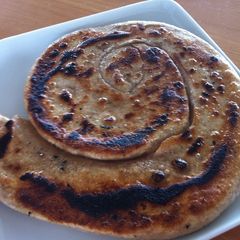 A picture of Paratha (Indian Flat-Bread).