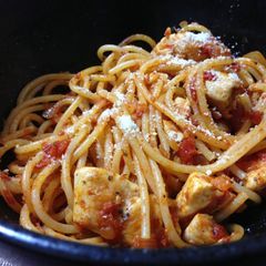 A picture of 15 Minute Chicken Pasta in a Garlic Tomato Sauce.
