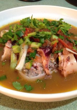 Hình của món Mực nhồi thịt sốt cà chua.