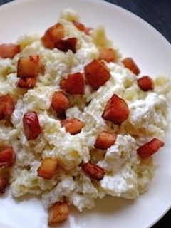 A picture of Bryndzové Halušky (Slovakian Potato Dumplings with Bryndza Cheese).
