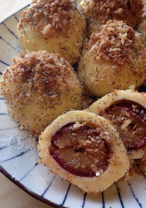 A picture of Zwetschgenknödel (Plum-stuffed Potato Dumplings).