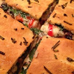 A picture of Goat Cheese and Veggie Stuffed Pizza .