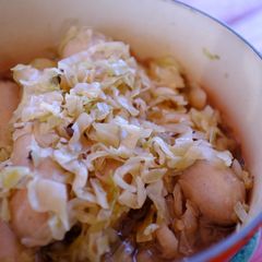 A picture of German Stewed Sauerkraut with Sausages.