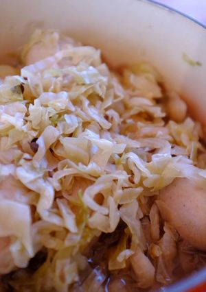 A picture of German Stewed Sauerkraut with Sausages.