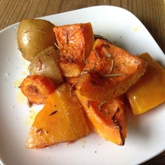 A picture of Oven Roasted Butternut Squash with Rosemary and Cumin.