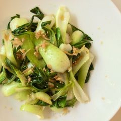 A picture of Bok Choy stir-fried with ginger.