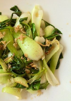 A picture of Bok Choy stir-fried with ginger.