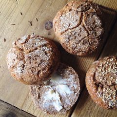 A picture of 100% Whole Grain Rye Sourdough Brötchen (German Rye Rolls).