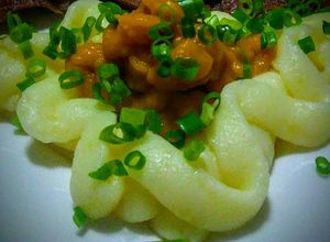 Una foto de Purín de Ahuyamas y Papas salpicado de cebollín🎅
