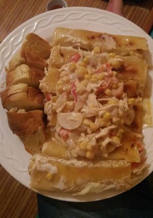 Una foto de Canelones rellenos de pollo y verduras