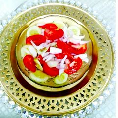 A picture of Tomato Onion Cucumber Salad.