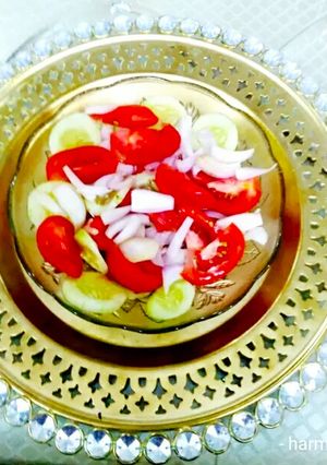 A picture of Tomato Onion Cucumber Salad.