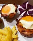Huevos en nido de panceta Ibérica