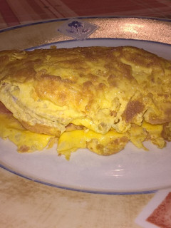 Una foto de Omelette con tomate (receta de Emma de 10 años)