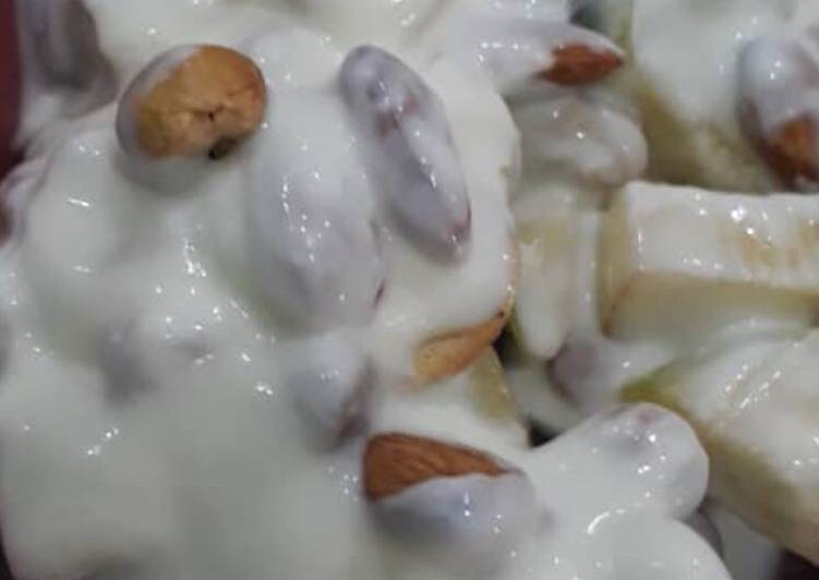 Chopped Apple with cashew nuts, Almond nuts and yoghurt