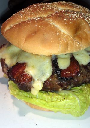 A picture of Gourmet blue cheese burgers..