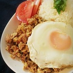 A picture of Spam Basil Rice with Fried Egg.