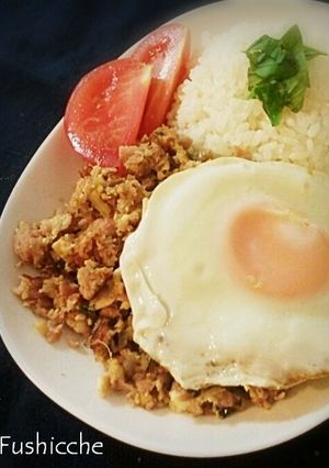 A picture of Spam Basil Rice with Fried Egg.