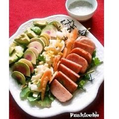 A picture of Cobb Salad with Homemade French dressing.