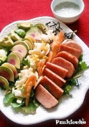 A picture of Cobb Salad with Homemade French dressing.
